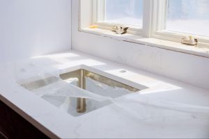 Large-format porcelain slab countertop in GTA kitchen renovation, heat and stain-resistant surface